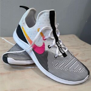 Nike White and Black Mesh Sneakers with Pink Swoosh and Yellow Accent